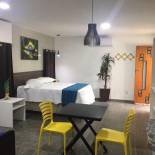 Фотография гостевого дома CASA LINDA - Seu cantinho em Guarapari, 1 minuto a pé da Praia do Morro! Suítes confortáveis e modernas - Para casal ou para grupos de até 5 pessoas