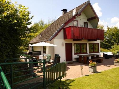 Фотография гостевого дома Ferienhaus 100 am See im Bergland