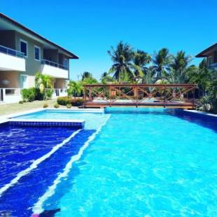 Фотографии гостевого дома
Guarajuba Village Verano A01