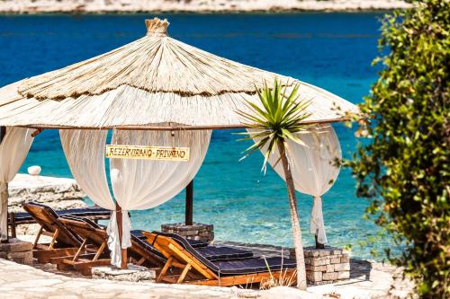 Фотография гостевого дома Pebble Bay Paradise House