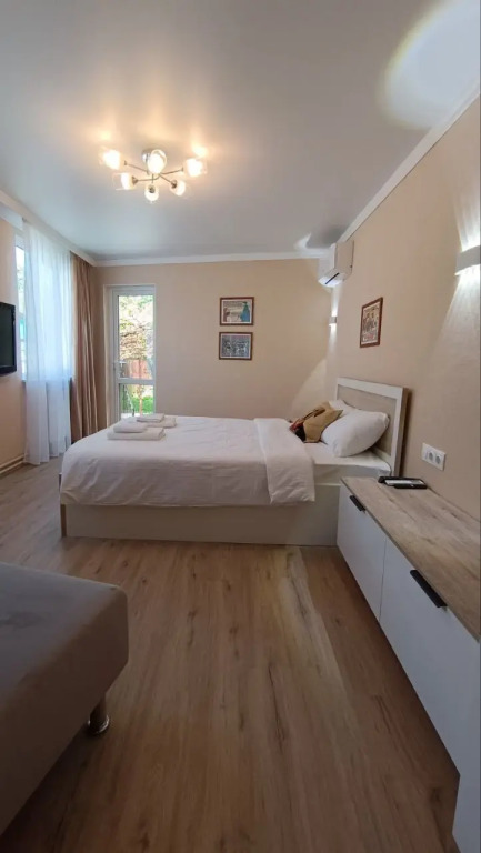 Фотография квартиры Квартира с одной спальней и выходом в сад