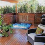Фотография гостевого дома Pandanus Spa Cottage