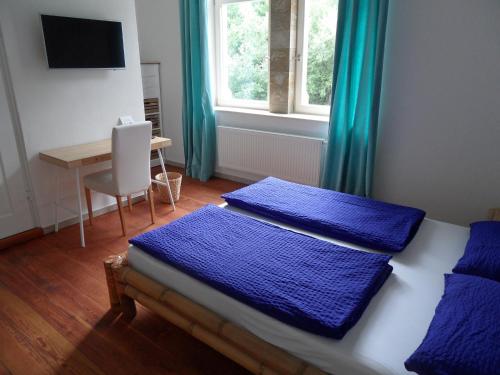 Фотографии гостевого дома 
            Im Bahnhof - Gästezimmer -