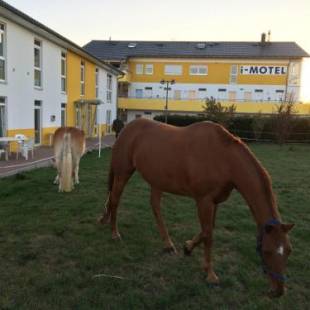 Фотографии гостиницы 
            i-Motel