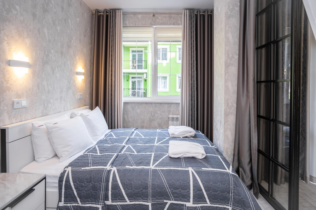 Фотография квартиры Апартаменты RED APARTMENTS Арт Лайт Сити апартамент Джойс