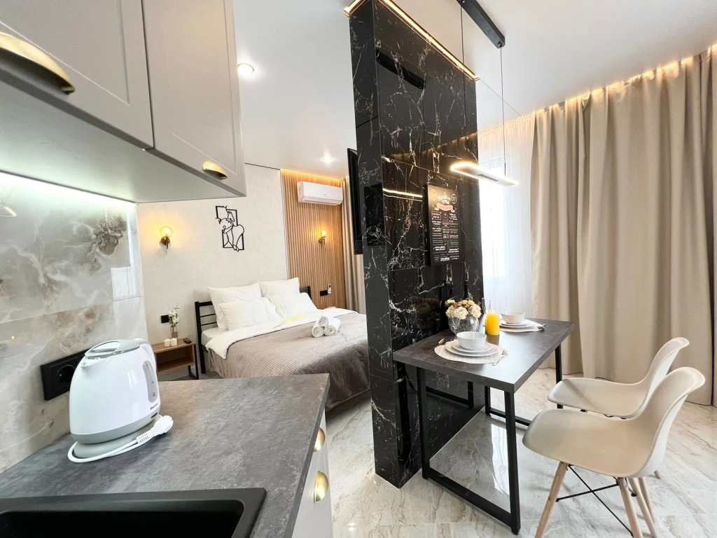 Фотография квартиры Апартаменты Уютная студия в тихом центре