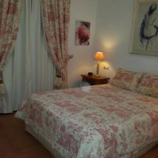 Фотографии гостевого дома 
            Olhando um Campo de Golf