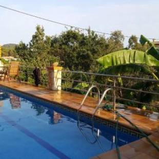 Фотографии гостевого дома 
            Casita con piscina y barbacoa privada