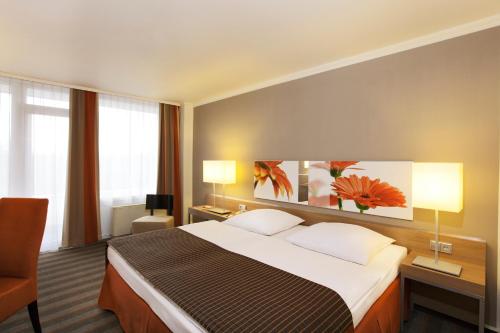 Фотография гостиницы H4 Hotel Frankfurt Messe
