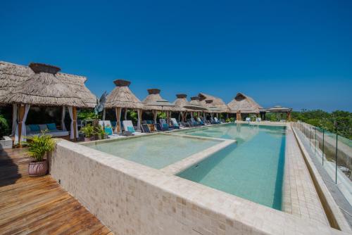 Фотографии гостиницы 
            Naay Tulum Curamoria Collection