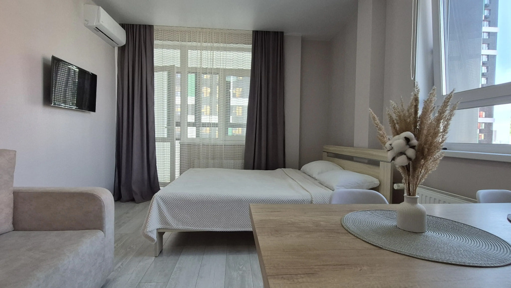 Фотография квартиры Квартира Уютная Студия в Зеленом Уголке Города