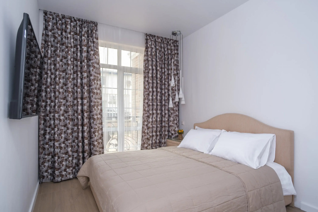 Фотография квартиры Апартаменты RED APARTMENTS Арт Лайт Сити апартамент Матис