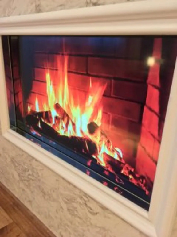 Фотография квартиры Апартаменты Однокомнатная квартира с камином и посудомойкой