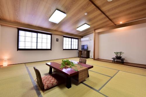 Фотография мини отеля Takenoya Ryokan (Guest House Takenoya)