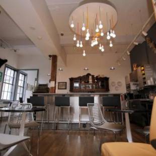 Фотографии мини отеля 
            Silverbow Inn Hotel & Suites