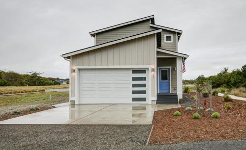 Фотография гостевого дома The Jetty House - Oyhut Bay Seaside Village