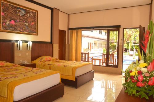 Фотография гостиницы Suriwathi Hotel Legian by Madhava - Hotel Dekat Pantai