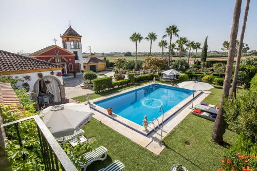Фотография гостевого дома Casa de Campo con Piscina en Sevilla en los Palacios y Villafranca