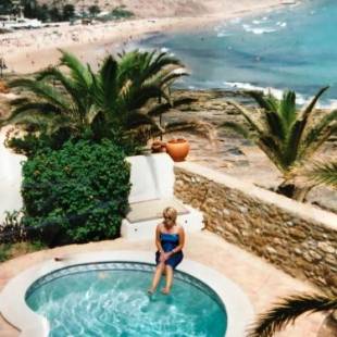 Фотографии гостевого дома 
            Beach front/waterside apartment