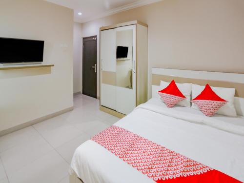 Фотография гостиницы OYO 90109 Wisma Basco Syariah