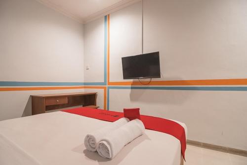 Фотография гостевого дома RedDoorz Plus near Alun Alun Kuningan