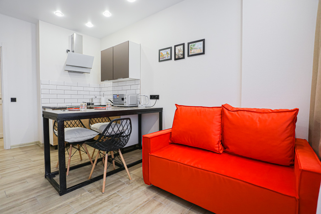 Фотография квартиры Квартира SunSet Красный Диван