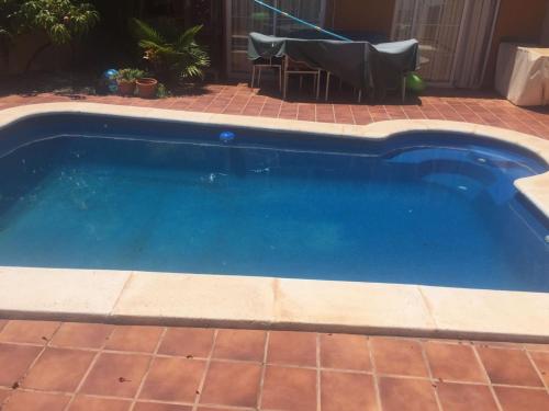 Фотография гостевого дома 3 bedrooms house with sea view shared pool and enclosed garden at Candelaria 1 km away from the beach