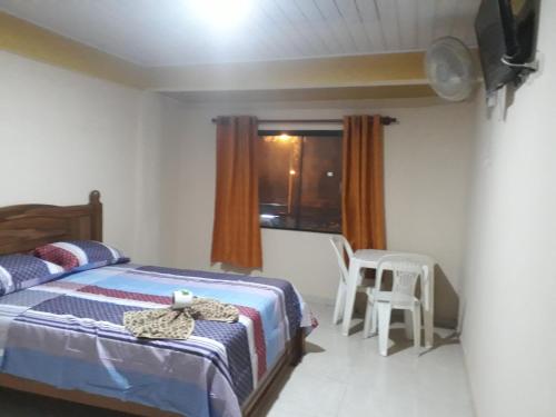 Фотография мини отеля Alojamiento Oasis