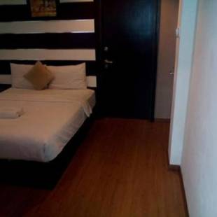 Фотографии гостиницы
Hotel Zamburger Taman Kapar