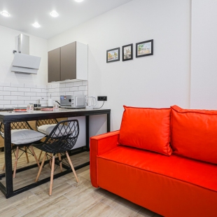 Фотография квартиры Квартира SunSet Красный Диван