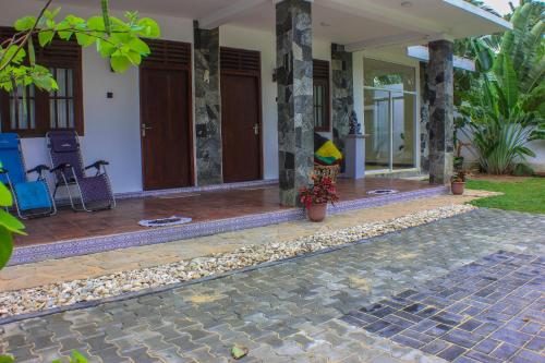 Фотография гостевого дома The Mango Leaf