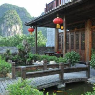 Фотографии гостиницы 
            Yangshuo Mountain Nest Boutique Hotel