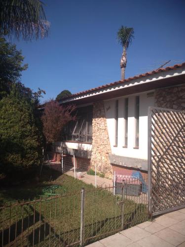 Фотография мини отеля Pousada Santa Felicidade Trieste com garagem D