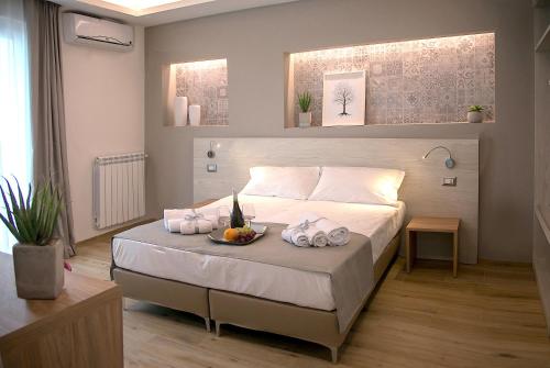 Фотография гостевого дома Musmelia Rooms - Affittacamere