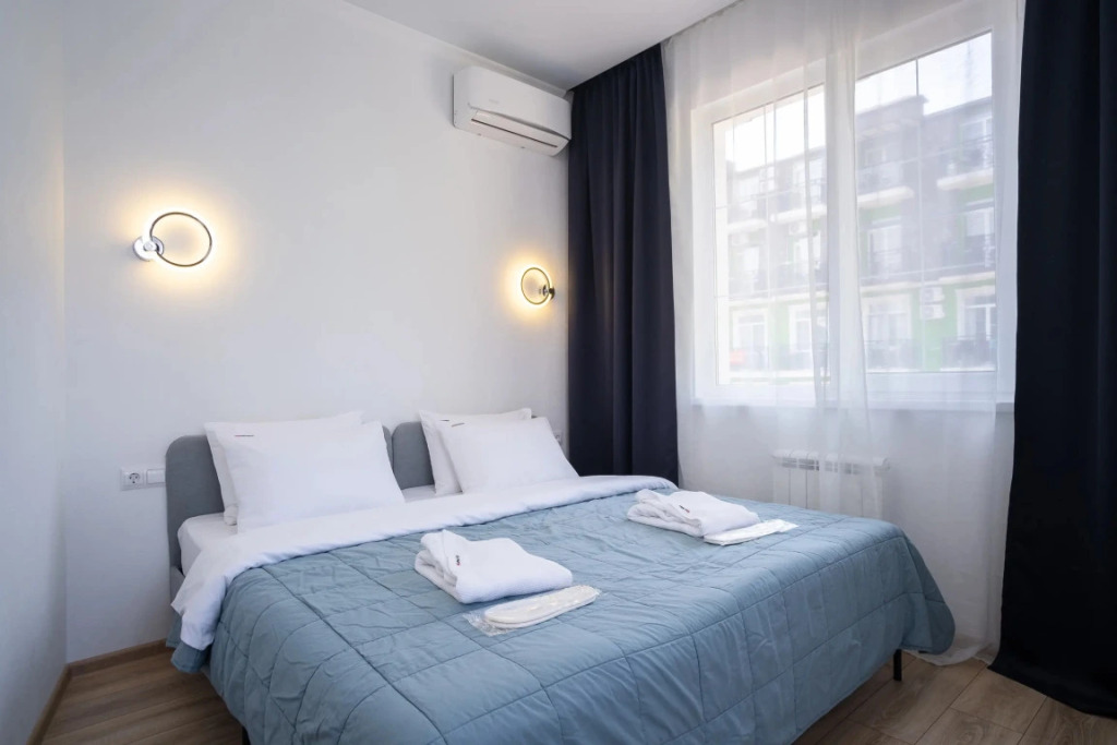 Фотография квартиры Апартаменты RED APARTMENTS Арт Лайт Дойл