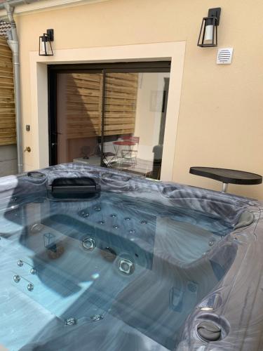 Фотография гостевого дома Sylina Spa avec Jacuzzi Privé