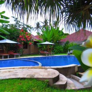 Фотографии мини отеля
Suka Sari Cottages