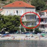 Фотография гостевого дома Apartments by the sea Podgora, Makarska - 6780