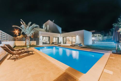 Фотография гостевого дома Belvedere Holidays Villas