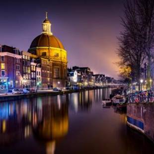 Фотографии мини отеля
Canal view suite