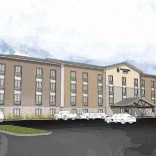 Фотографии гостиницы 
            WoodSpring Suites Davenport Quad Cities