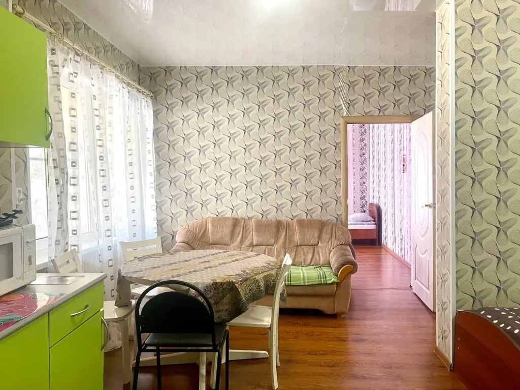 Фотография квартиры Апартаменты С кухней гостиной и отдельной спальней