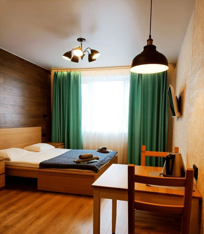 Фотография квартиры Апартаменты СитиЦентр Двухместные с Видом на Озеро 2