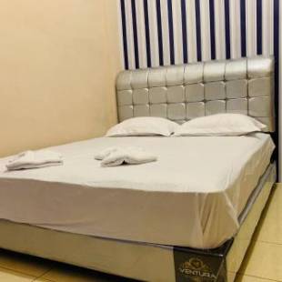 Фотографии гостиницы 
            OYO 3389 Sonya Homestay Syariah