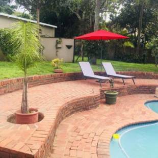 Фотографии гостевого дома 
            Beautiful Villa - Scottburgh, Durban