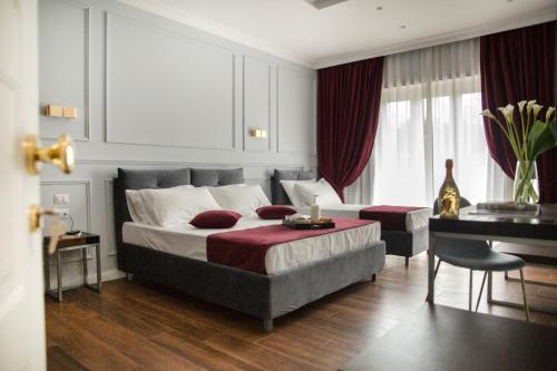 Фотография мини отеля Unicum Roma Suites