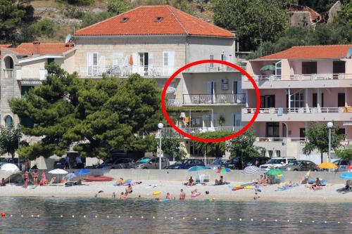 Фотография гостевого дома Apartments by the sea Podgora, Makarska - 6780