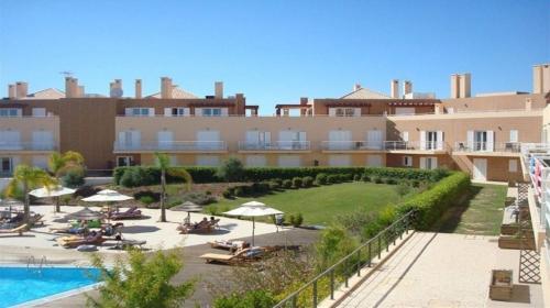 Фотография гостевого дома 2BR Cabanas Gardens piscina e praia