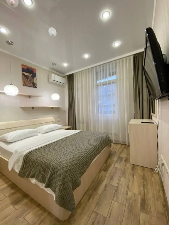 Фотография квартиры Апартаменты с двумя спальнями и балконом Ajax на Тюльпанов 41