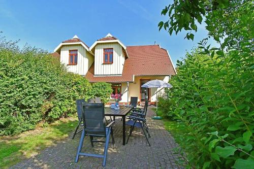 Фотография гостевого дома Ferienhaussiedlung Strandperlen Küstenhof 5b (Typ X)